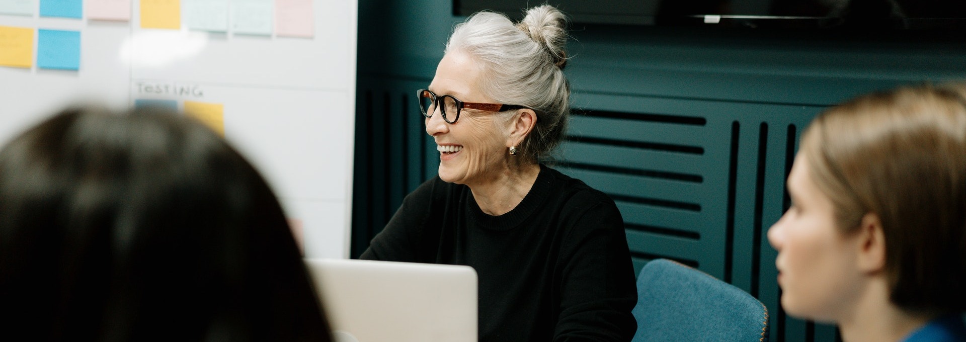 Woman smiling during roudntable