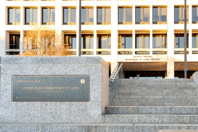 The United States Department of Labor (DOL) sign and building in Washington, DC.